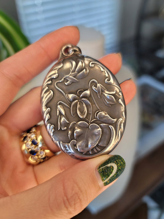 French repousse mirror locket