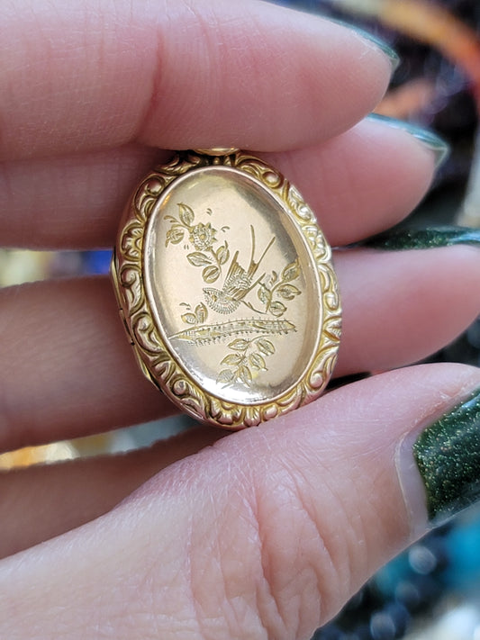 9ct gold swallow locket